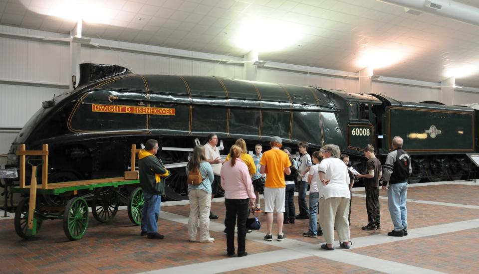 Visitors check out the Dwight D. Eisenhower locomotive at the National Railroad Museum in Green Bay.