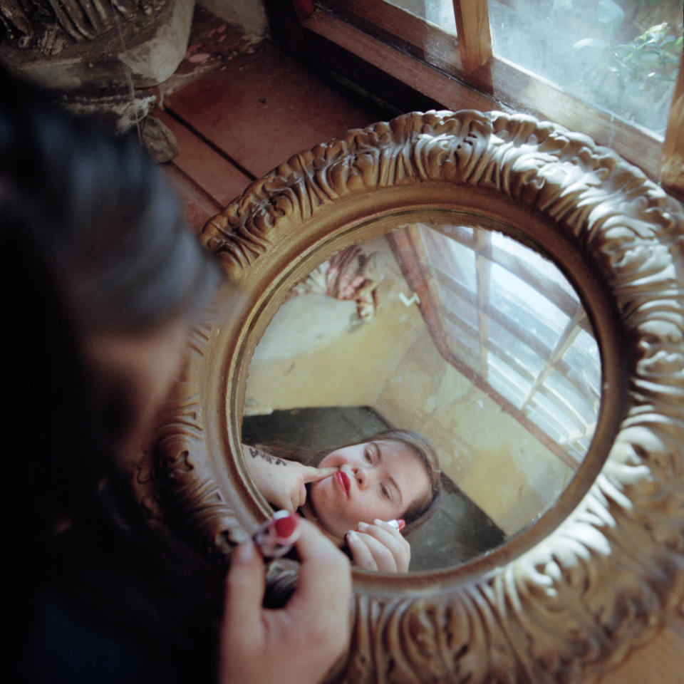 For years, a photographer took photos of a young woman with Down syndrome, helping teach her what we too rarely see about those with the disorder