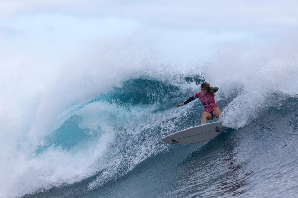 Caroline Marks cuts into a wave during her gold medal match. She defended Team USA's title.