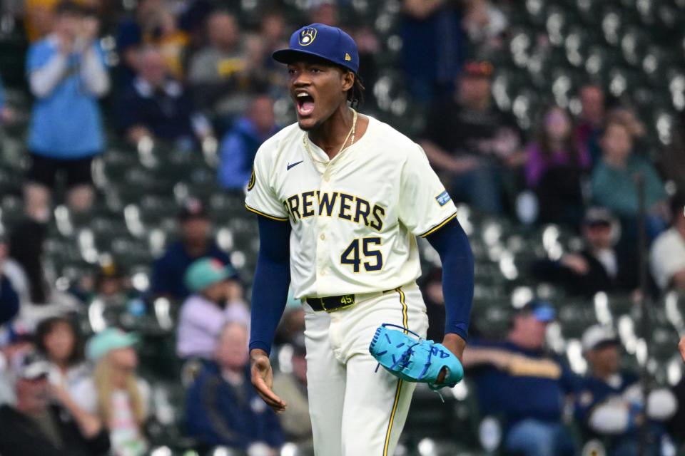 Brewers pitcher Abner Uribe reacts after getting out of a jam in the eighth inning Wednesday.