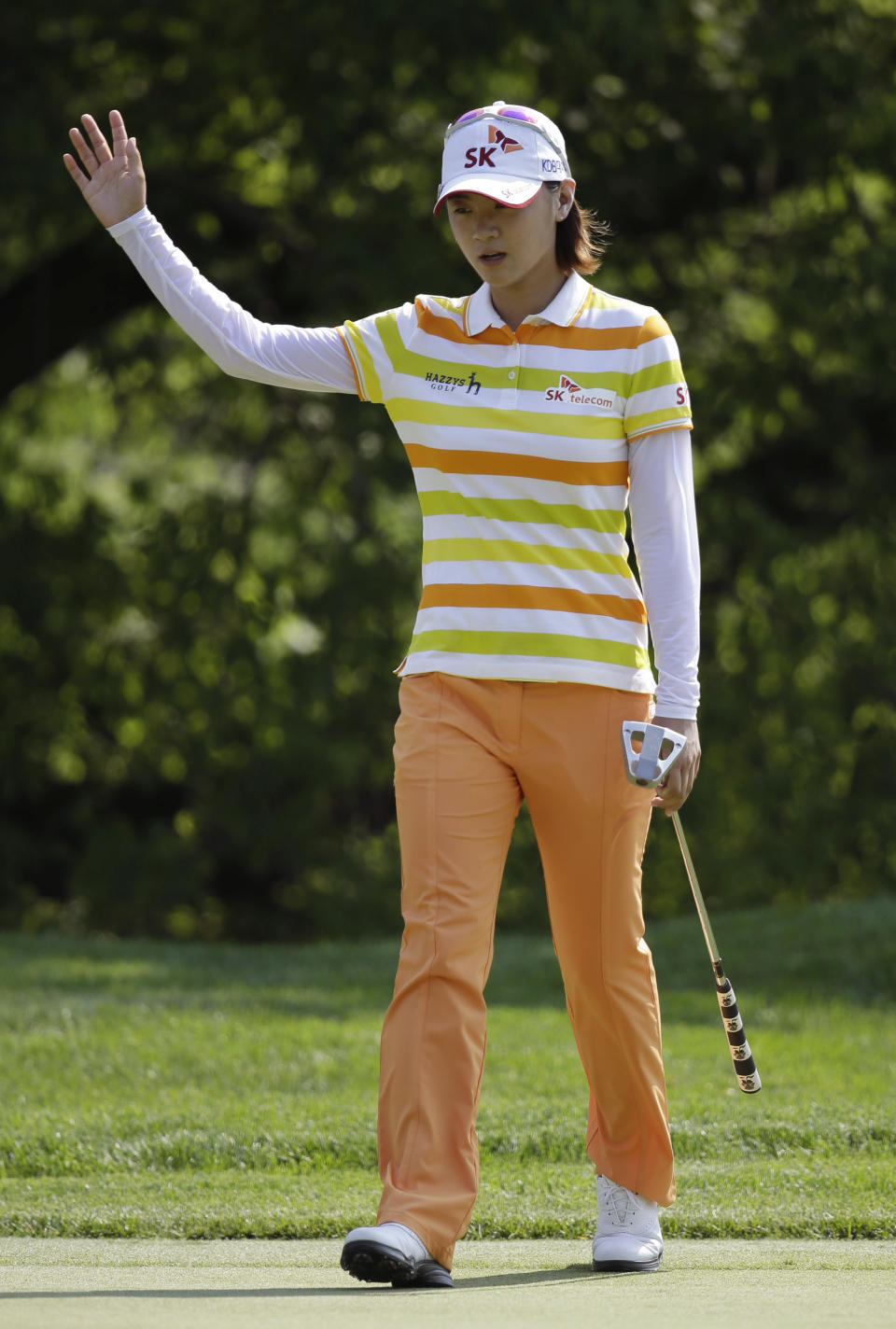 Na Yeon Choi, of South Korea, reacts after sinking a putt for birdie on the fifth green during the first round of the U.S. Women's Open golf tournament, Thursday, July 5, 2012, in Kohler, Wis. (AP Photo/Julie Jacobson)