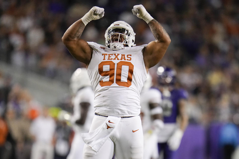 Texas defensive lineman Byron Murphy II reacts after collecting a sack against TCU during the first half of an NCAA college football game, Saturday, Nov. 11, 2023, in Fort Worth, Texas. (AP Photo/Julio Cortez)