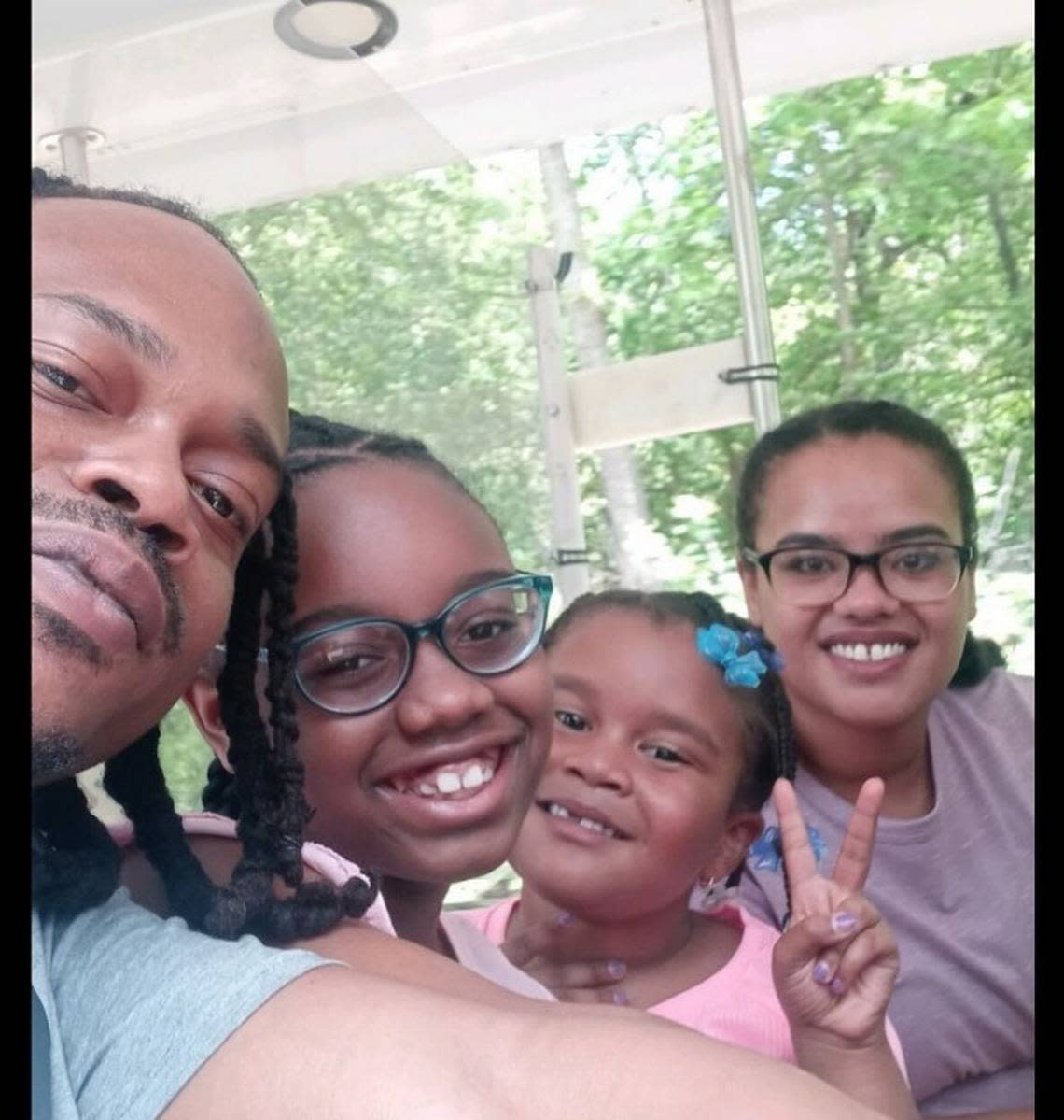 Chris Beaugard, 35, poses with his girlfriend, Tashee Yankah, and his two daughters. Yankah said Beaugard was the best father and was always involved in the girls’ lives.