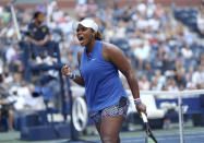 Taylor Townsend, of the United States, reacts after scoring a point against Simona Halep, of Romania, during the second round of the US Open tennis championships Thursday, Aug. 29, 2019, in New York. (AP Photo/Kevin Hagen)