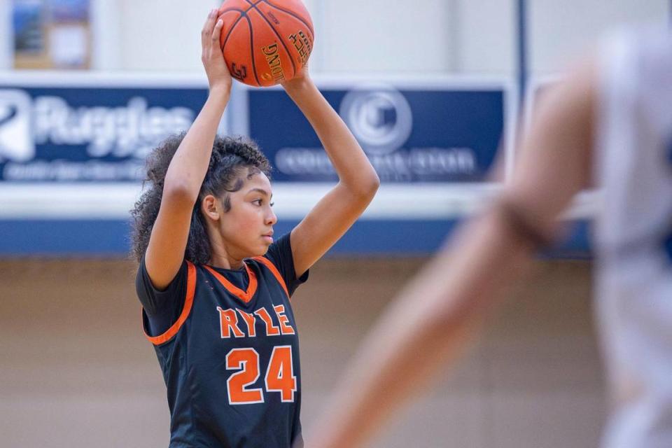 Seventh grader Jayden McClain, playing her first varsity season with Ryle High School, is 6-foot-5 and already boasts six Division I scholarship offers.