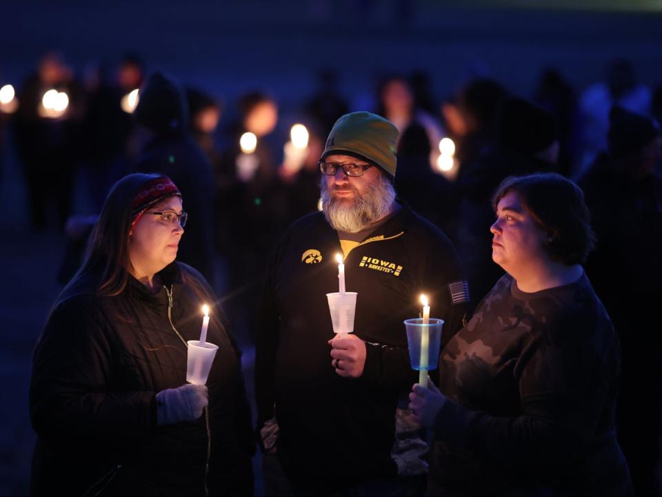 Community members gather in Wiese park for a candlelight vigil following the morning shooting at the Perry Middle School and High School complex on January 04, 2024 in Perry, Iowa. A 17-year-old student identified by authorities as Dylan Butler opened fire at the school on the first day back from the winter break, killing a student and wounding five others (Getty Images)