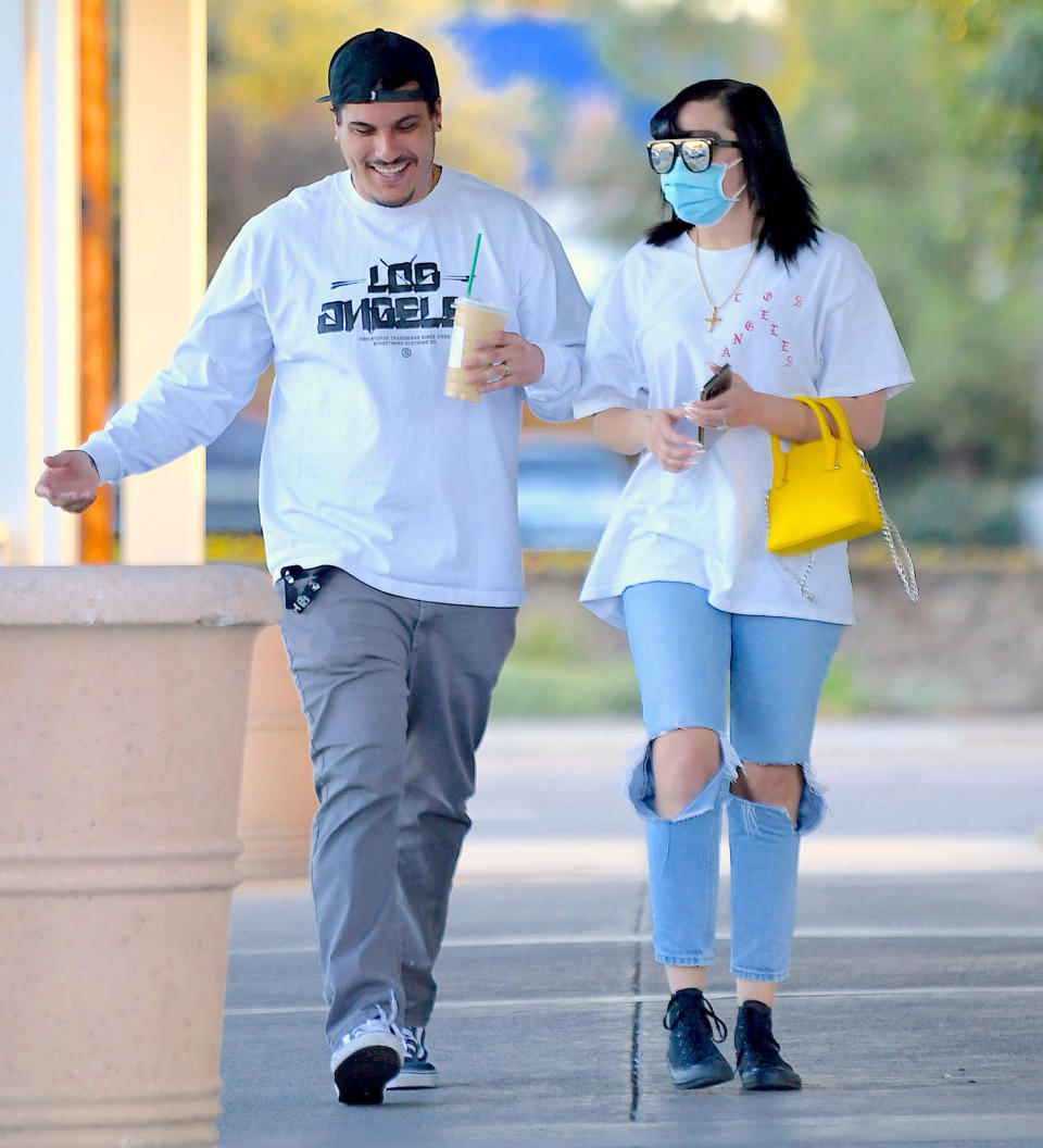 <p>Amanda Bynes and fiancé Paul Michael keep it light on Tuesday for a coffee walk in Calabasas, California. </p>
