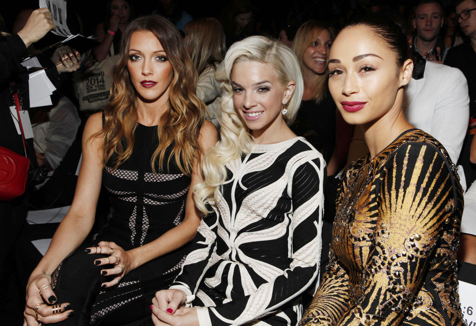 Katie Cassidy, Lauriana Mae and Cara Santana attend the Herve Leger collection on Saturday, Sept. 7, 2013, during Mercedes-Benz Fashion Week in New York. (Photo by Amy Sussman/Invision/AP)