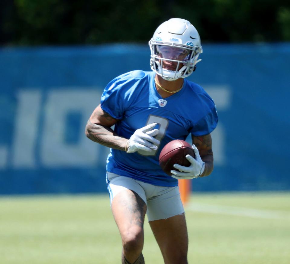 Lions wide receiver Marvin Jones Jr. catches a pass during OTAs on Thursday, May 25, 2023, in Allen Park.