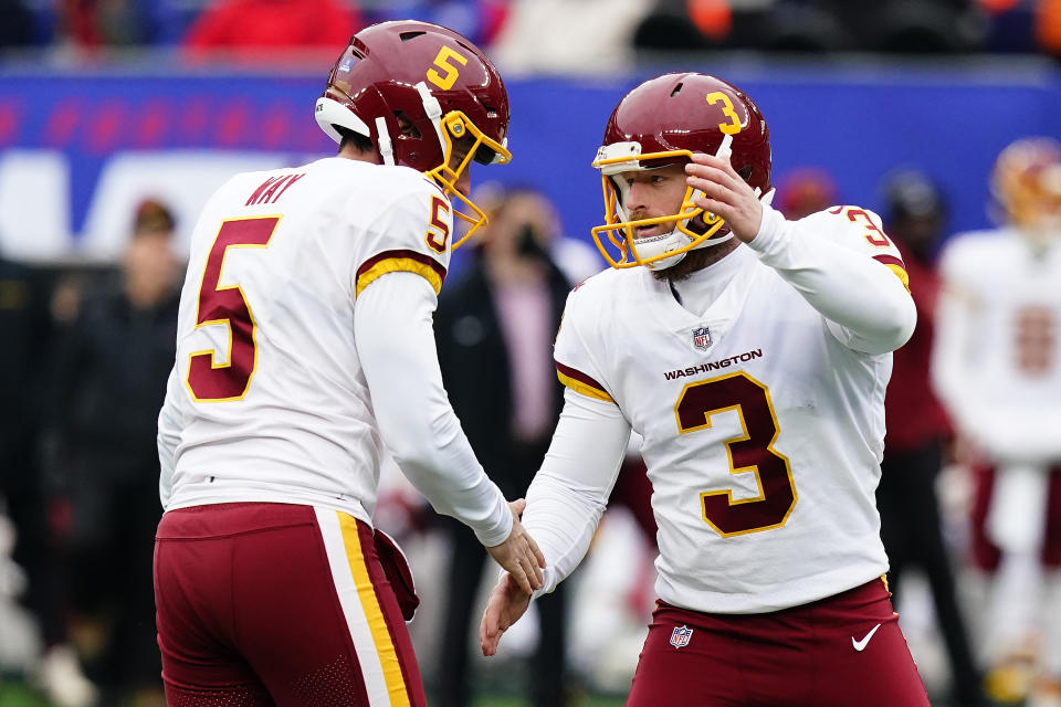 Washington Football Team kicker Joey Slye (3) is congratulated by place holder Tress Way (5) after kicking a field goal against the New York Giants during the second quarter of an NFL football game, Sunday, Jan. 9, 2022, in East Rutherford, N.J. (AP Photo/Frank Franklin II)