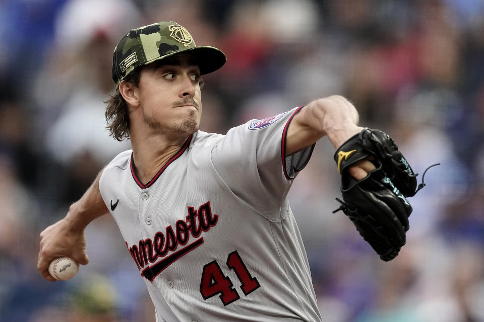 Minnesota Twins starting pitcher Joe Ryan throws during the first inning of a baseball game against the Kansas City Royals Saturday, May 21, 2022, in Kansas City, Mo. (AP Photo/Charlie Riedel)