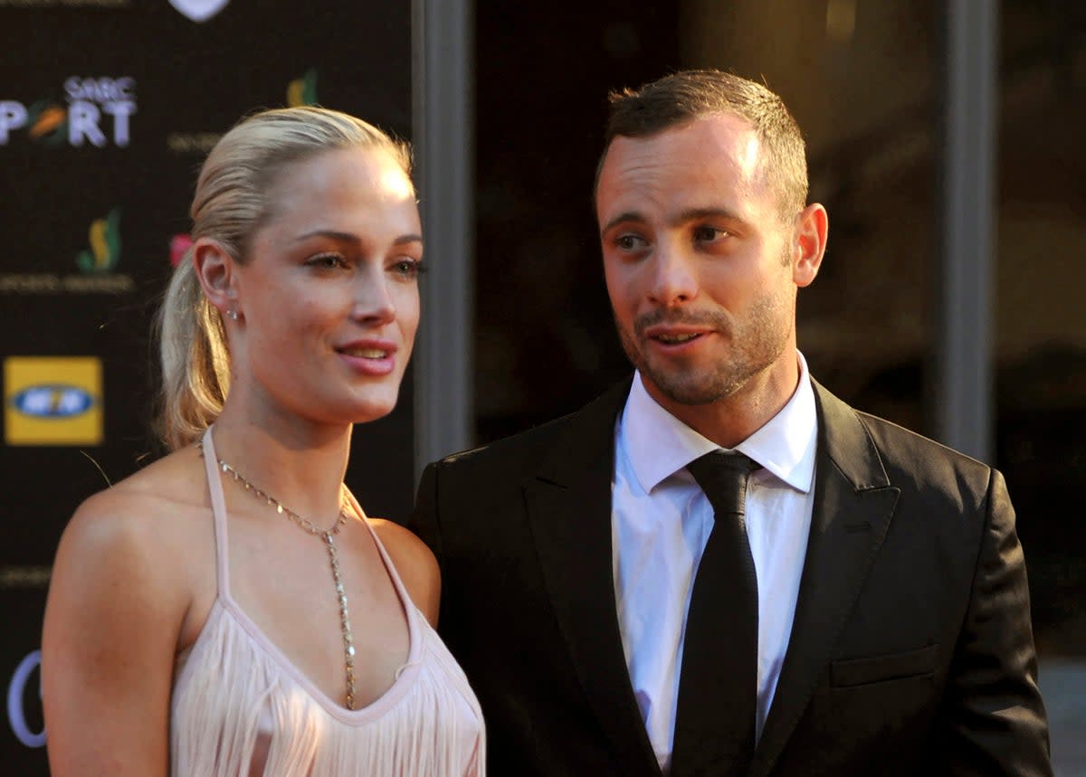 The athlete has served half of his 13-year sentence for the murder of Reeva Steenkamp (left) (AP)
