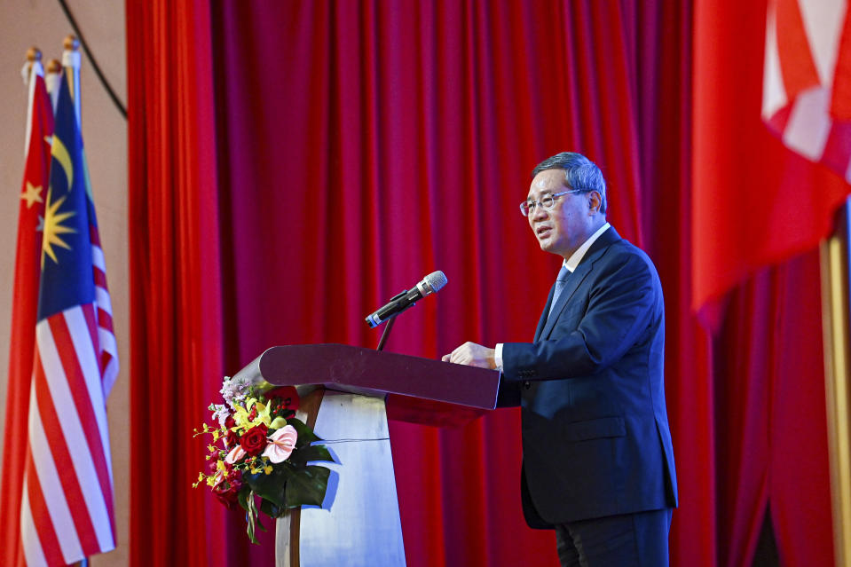 In this photo released by Malaysia's Department of Information, China's Premier Li speaks during business luncheon with Malaysian Prime Minister Anwar Ibrahim at a hotel in Kuala Lumpur, Malaysia, Thursday, June 20, 2024. (Malaysia's Department of Information via AP)