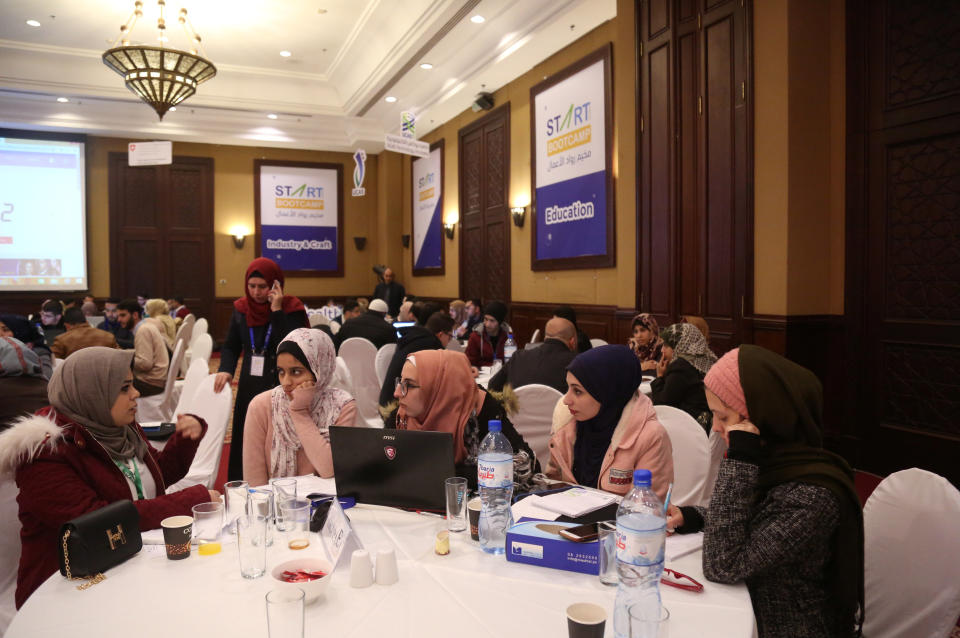 Nada Rudwan (L), 27, a graduate of English faculty, takes part in a startup workshop in Gaza City, Jan. 29, 2019. "It was difficult to find a job, so I thought of doing something I like and that will make me money at the same time," said Rudwan, who posts cooking tutorials to social media platforms under the name "Nada Kitchen". "It is an attempt to beat the physical blockade of Gaza by finding a job that just needs some talent, a camera and internet connection," she added. (Photo: Samar Abo Elouf/Reuters)