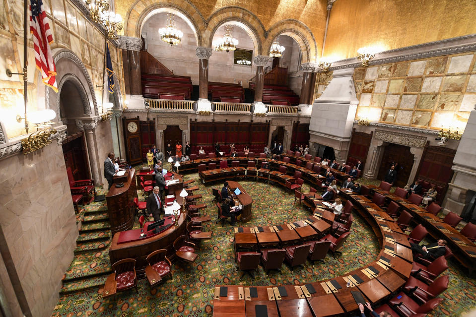 New York Lt. Gov. Antonio Delgado ,left, presides over the Senate during a special legislative session to consider new firearms regulations for concealed-carry permits in the Senate Chamber at the state Capitol Thursday, June 30, 2022, in Albany, N.Y. (AP Photo/Hans Pennink)