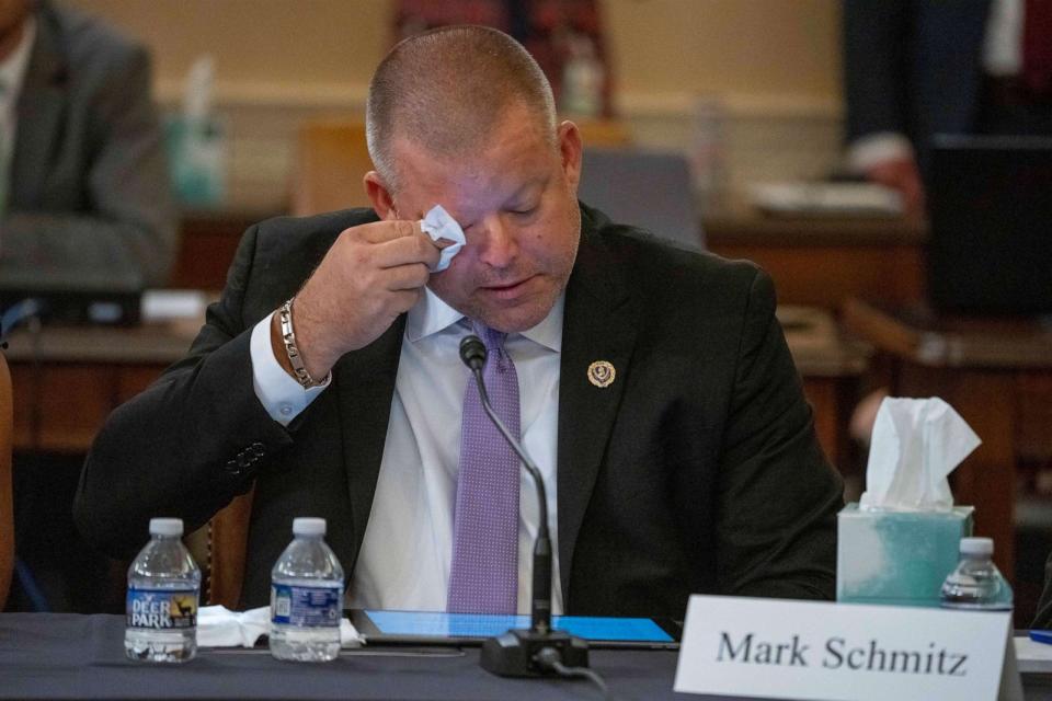 PHOTO: Mark Schmitz, father of Marine Corps Lance Cpl. Jared Schmitz, an Abbey Gate Gold Star family member, wipes a tear as he speaks at a House Foreign Affairs Committee roundtable, on Capitol Hill, Aug. 29, 2023 in Washington. (Alex Brandon/AP)