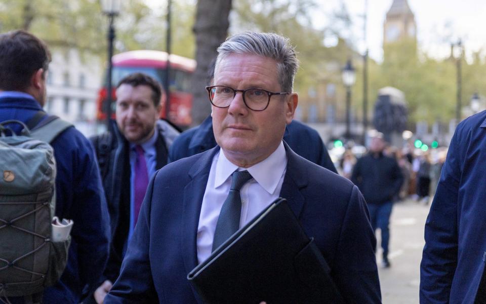 Sir Keir Starmer, the Labour leader, is pictured today in Whitehall