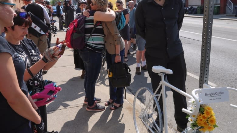 Dozens take part in ghost bike memorial ride for cyclist struck and killed last week