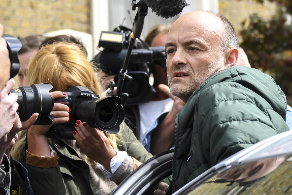 Britain's Prime Minister Boris Johnson's senior aid Dominic Cummings leaves his home, in London, Sunday, May 24, 2020. Several lawmakers from Britain’s governing Conservative Party have joined opposition calls for Johnson’s top aide to be fired for flouting lockdown rules. Dominic Cummings traveled 250 miles (400 kms) to his parents’ home with his wife and son as he was coming down with COVID-19 at the end of March. (AP Photo/Alberto Pezzali)