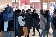 Shoppers visit Yorkdale Mall in the Toronto suburb of North York