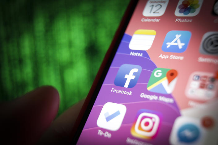 The Facebook logo is seen on a mobile device in this photo illustration on January 20, 2019. The Federal Trade Commission is considering fining the social media giant with a record fine for violating failing to protect user data according to the Washington Post. (Photo by Jaap Arriens / Sipa USA)