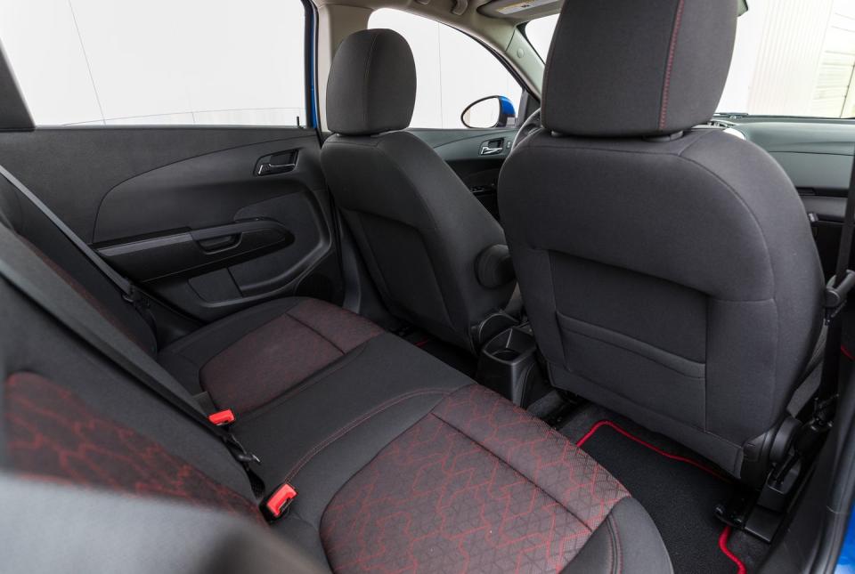 <p>The rear seat is economy-car tight; there's enough room for short trips, but larger passengers will want to avoid extended voyages. Honda's subcompact competitor, <a rel="nofollow noopener" href="https://www.caranddriver.com/honda/fit" target="_blank" data-ylk="slk:the Fit;elm:context_link;itc:0;sec:content-canvas" class="link ">the Fit</a>, provides more passenger volume in both rows.</p>