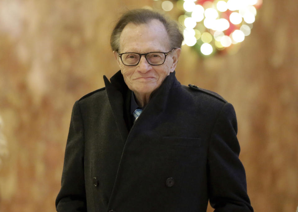 FILE - In this Dec. 1, 2016 file photo, Larry King arrives at Trump Tower in New York. King, who interviewed presidents, movie stars and ordinary Joes during a half-century in broadcasting, has died at age 87. Ora Media, the studio and network he co-founded, tweeted that King died Saturday, Jan. 23, 2021 morning at Cedars-Sinai Medical Center in Los Angeles. (AP Photo/Richard Drew, File)