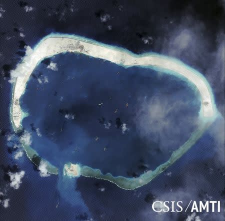 Mischief Reef is shown in this handout satellite image dated September 8, 2015 and provided by CSIS Asia Maritime Transparency Initiative/Digital Globe September 14, 2015. REUTERS/CSIS Asia Maritime Transparency Initiative/Digital Globe