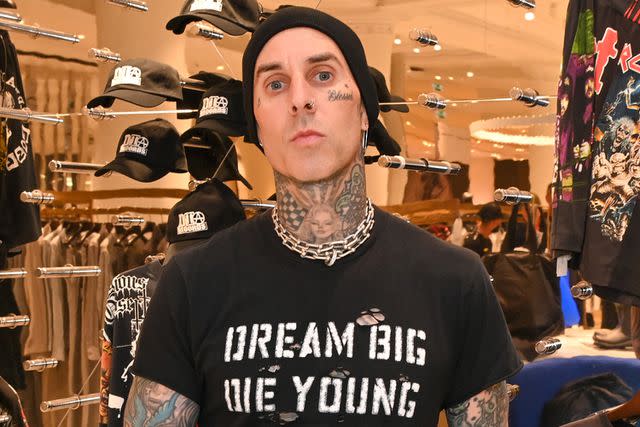 <p>Dave Benett/Getty Images</p> ravis Barker attends the launch of Travis Barker's fashion brand DTA (Don't Trust Anyone) exclusively at Selfridges on October 10, 2023 in London, England.