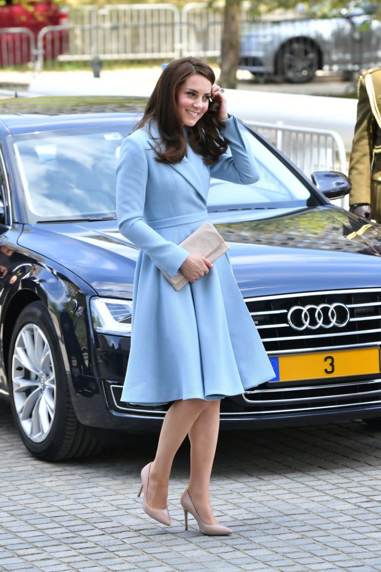<i>Kate opted for a pale blue tailored look [Photo: PA]</i>