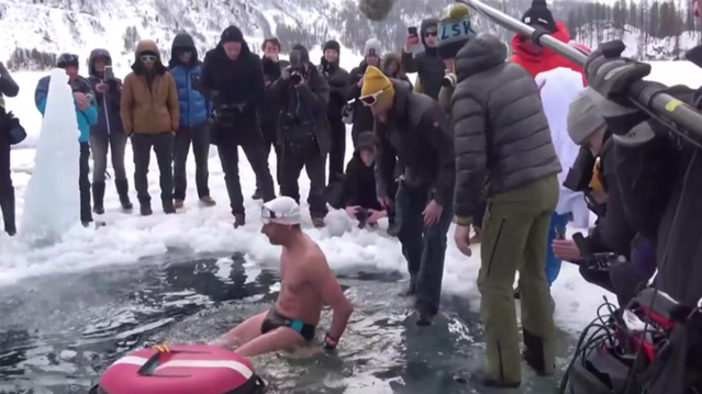 Diver plunges 50 metres down icy lake in Switzerland