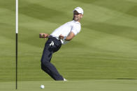Tennis player Novak Djokovic reacts to his putt on the 18th green during an all stars golf match between Team Colin Montgomerie and Team Cory Pavin at the Marco Simone Golf Club in Guidonia Montecelio, Italy, Wednesday, Sept. 27, 2023. The Ryder Cup starts Sept. 29, at the Marco Simone Golf Club. (AP Photo/Andrew Medichini)