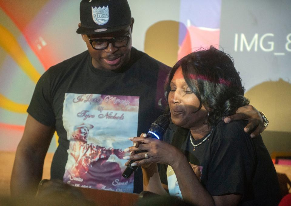 RowVaughn Wells, right, is comforted by her attorney Kareem Ali, as she speaks at a memorial for her son, Tyre Nichols, at the Sac Ramp Skate Shop in Sacramento, California on Saturday, Feb. 4, 2023. Nichols, who was beaten to death by Memphis police following a traffic stop in January, grew up in Sacramento and has ties to the skateboarding community.