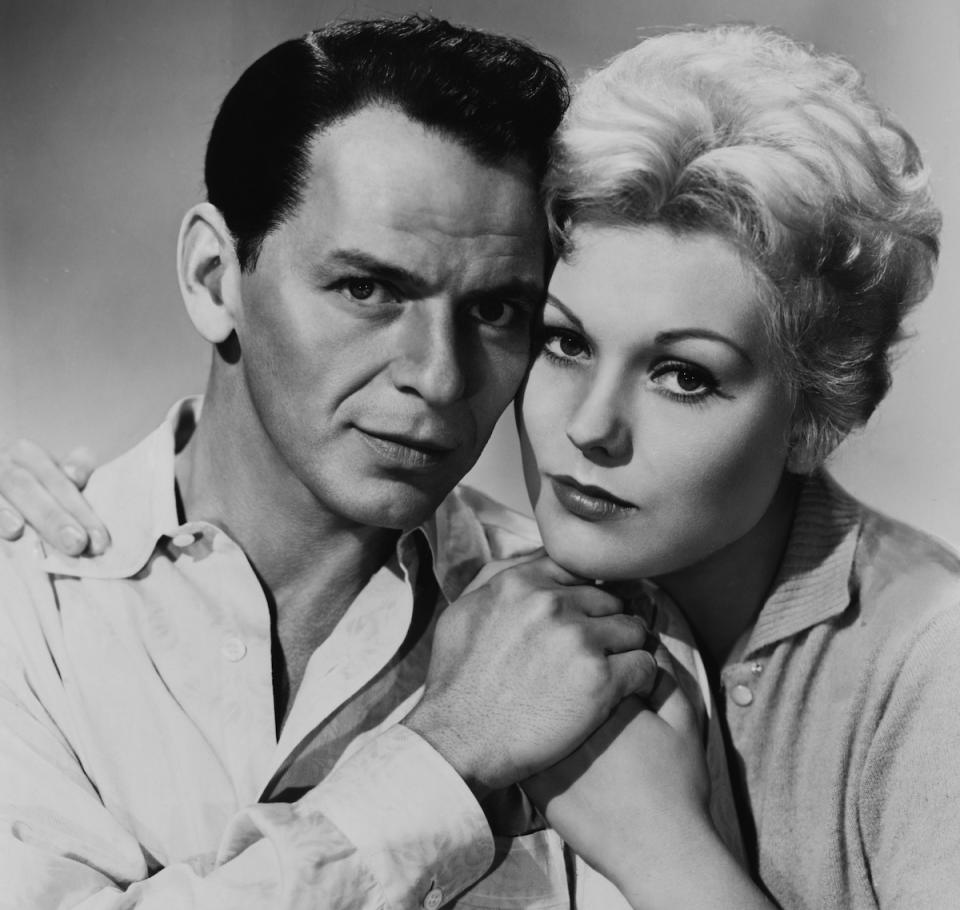 American actor and singer Frank Sinatra (1915 - 1998) stars with Kim Novak in 'The Man with the Golden Arm', 1955