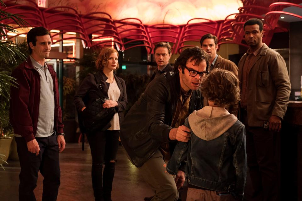 Richie Tozier (Bill Hader, front) and the rest of the Losers' Club (James Ransone, Jessica Chastain, James McAvoy, Jay Ryan and Isaiah Mustafa) face Pennywise as adults in "It: Chapter Two."