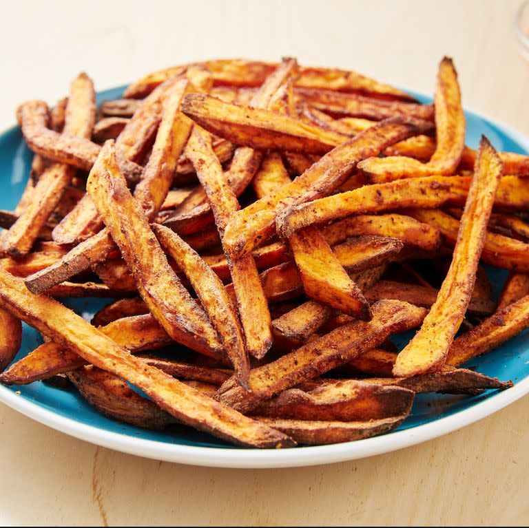 <p>We love a good, crispy <a href="https://www.delish.com/uk/cooking/recipes/a28841618/perfect-baked-sweet-potato-recipe/" rel="nofollow noopener" target="_blank" data-ylk="slk:sweet potato;elm:context_link;itc:0;sec:content-canvas" class="link ">sweet potato</a> fry. Though the oven-baked variety is great, these air fryer fries get even crispier and take way less time! Paired with our favourite 3-ingredient secret sauce, we can't think of a better snack. </p><p>Get the <a href="https://www.delish.com/uk/cooking/recipes/a31012172/air-fryer-sweet-potato-recipe/" rel="nofollow noopener" target="_blank" data-ylk="slk:Air Fryer Sweet Potato Fries;elm:context_link;itc:0;sec:content-canvas" class="link ">Air Fryer Sweet Potato Fries</a> recipe.</p>