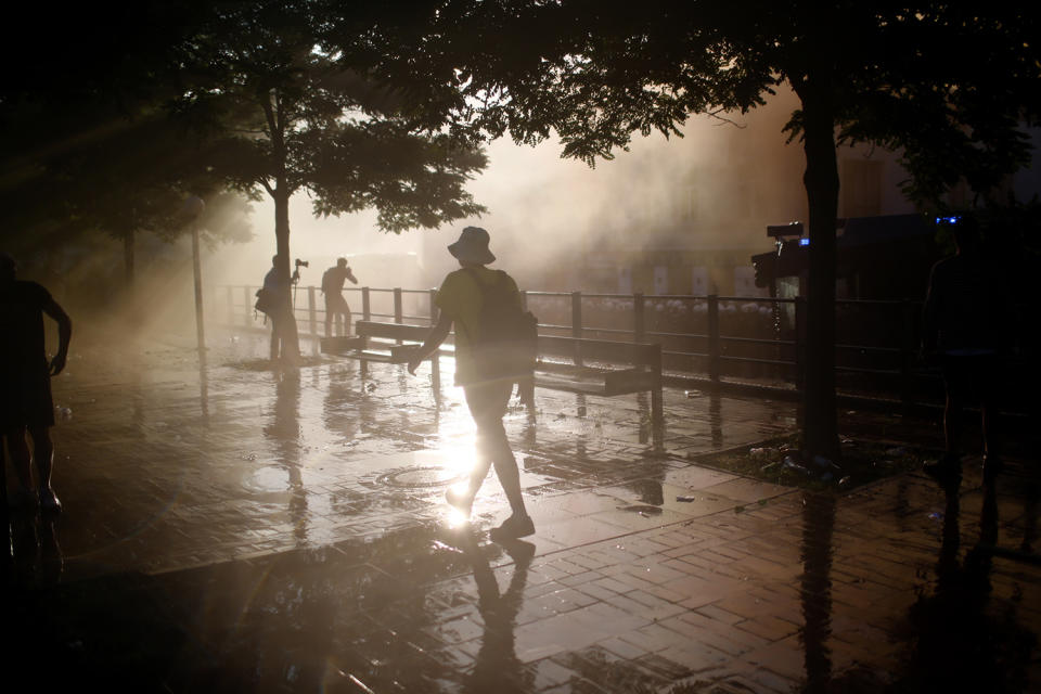 <p>German riot police use water cannons against protesters during the demonstrations during the G20 summit in Hamburg, Germany, July 6, 2017. (Photo: Hannibal Hanschke/Reuters) </p>