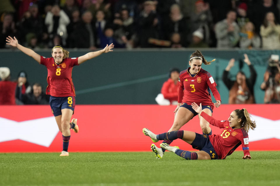Spain's Olga Carmona, right, celebrates after she scored her side's second goal during the Women's World Cup semifinal soccer match between Sweden and Spain at Eden Park in Auckland, New Zealand, Tuesday, Aug. 15, 2023. (AP Photo/Alessandra Tarantino)
