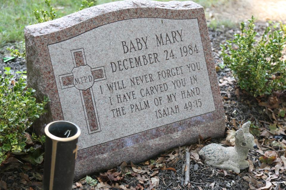 Morristown, NJ September 7, 2023 — The headstone for Baby Mary at St. Joseph’s Church in Mendham. The Morris County Prosecutor’s Office held a press conference to announce that charges have been filed in the 1984 cold case homicide of “Baby Mary”, a newborn baby girl found abandoned and deceased pn Christmas Eve of 1984.