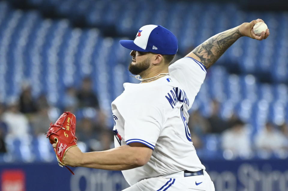 Toronto Blue Jays starting pitcher Alek Manoah throws against the Chicago White Sox in the first inning of a baseball game in Toronto, Thursday, June 2, 2022. (Jon Blacker/The Canadian Press via AP)