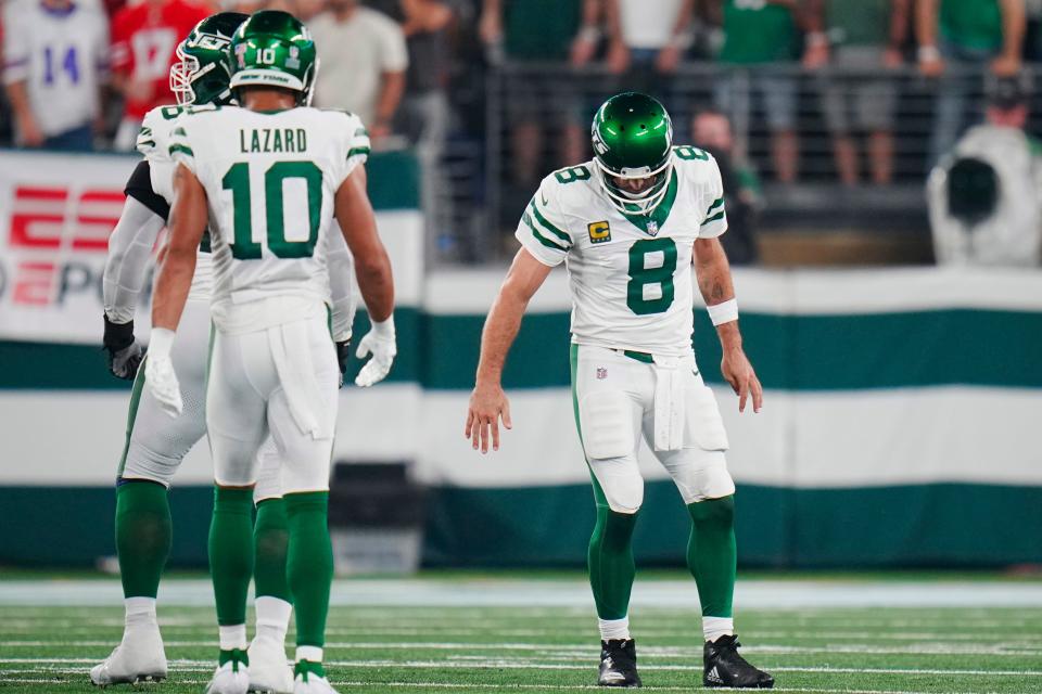 New York Jets quarterback Aaron Rodgers (8) limps after a sack during the first half of an NFL football game against the Buffalo Bills on Monday, Sept. 11, 2023, in East Rutherford, N.J.