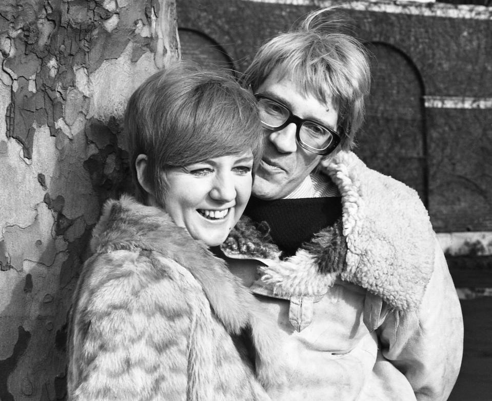 FILE - British pop singer Cilla Black and actor David Warner are pictured at the Duke of York's Barracks in Chelsea, London, Jan. 19, 1967. Warner, a versatile British actor whose roles ranged from Shakespeare to sci-fi cult classics, has died. He was 80. Warner’s family said he died from a cancer-related illness on Sunday, July 24, 2022 at Denville Hall, a retirement home for entertainers in London. (AP Photo, FiIe)