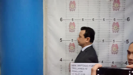 A handout photo from Philippine National Police showing a mugshot of Senator Antonio Trillanes being taken at Makati police headquarters in Makati City, Metro Manila in Philippines September 25, 2018. Philippine National Police/Handout via REUTERS