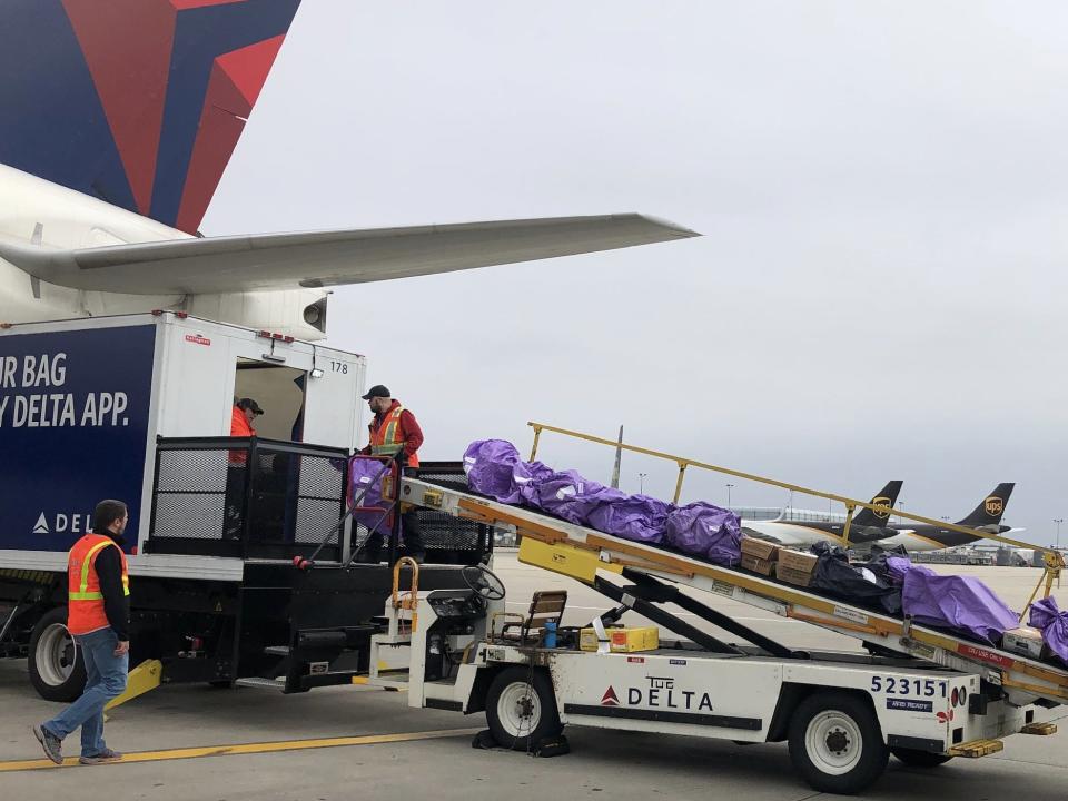 Delta cargo loading into an aircraft.