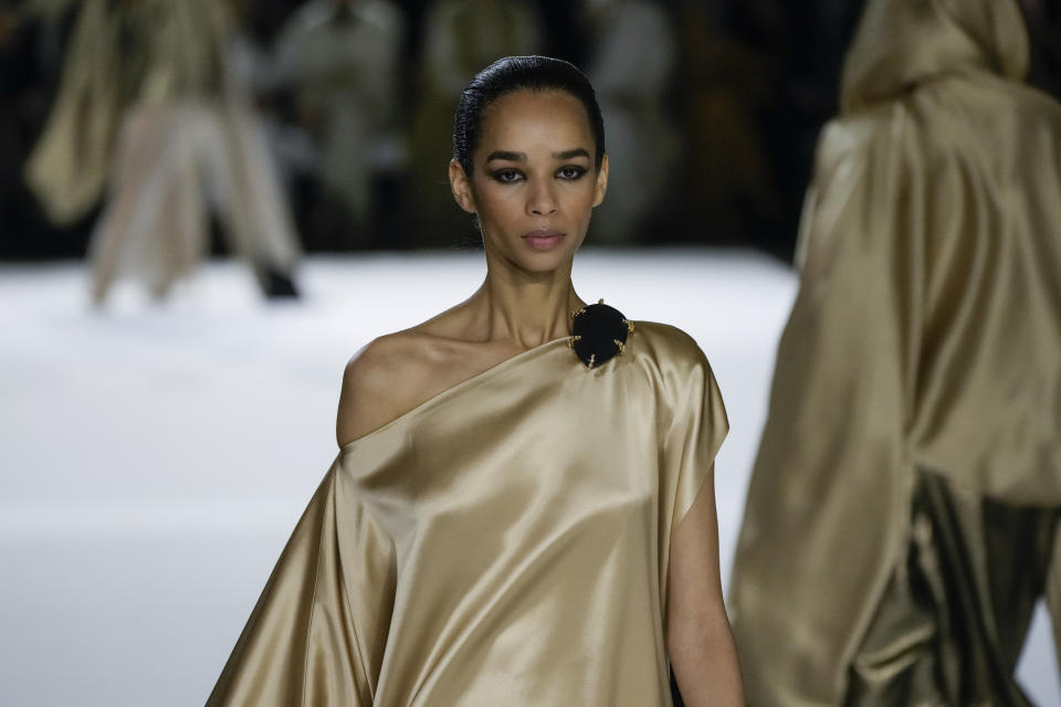 A model wears a creation for the Stephane Rolland Spring-Summer 2022 Haute Couture fashion collection collection, in Paris, Tuesday, Jan. 25, 2022. (AP Photo/Francois Mori)