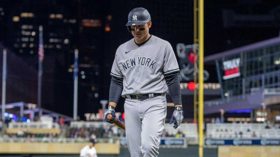 New York Yankees first baseman Anthony Rizzo (48) walks back to the dugout after striking out during the eighth inning against the Minnesota Twins at Target Field