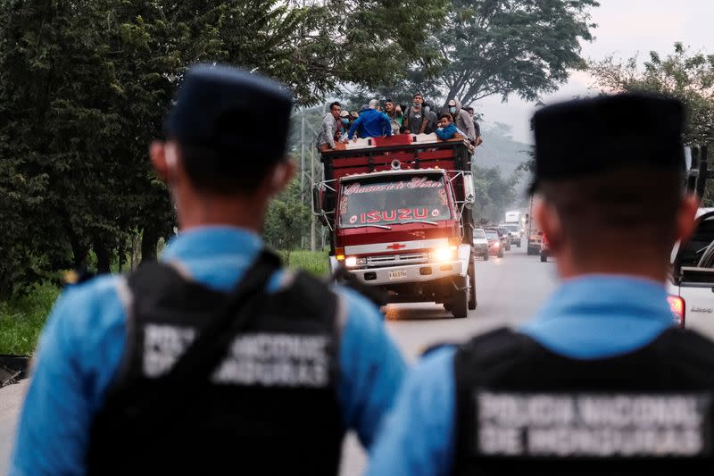 Hondurans take part in a new caravan of migrants, set to head to the United States, in San Pedro Sula