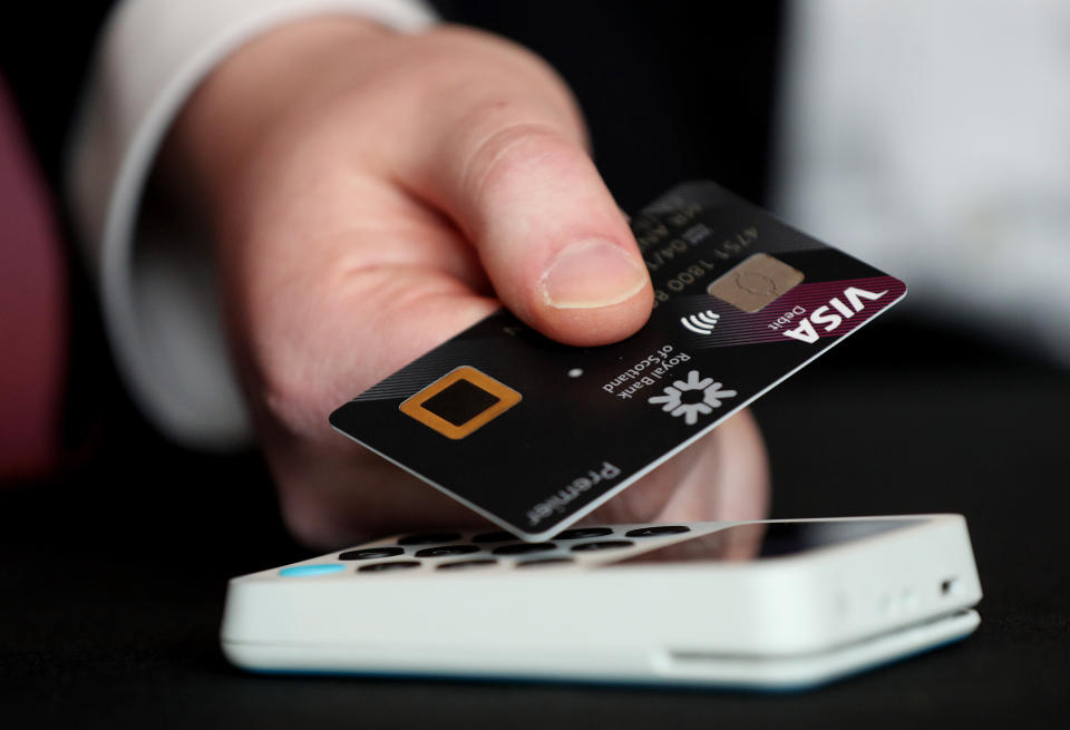 A 'biometric fingerprint debit card' being demonstrated during its launch at NatWest, 280 Bishopsgate, London. Photo: Jonathan Brady/PA Wire/PA Images