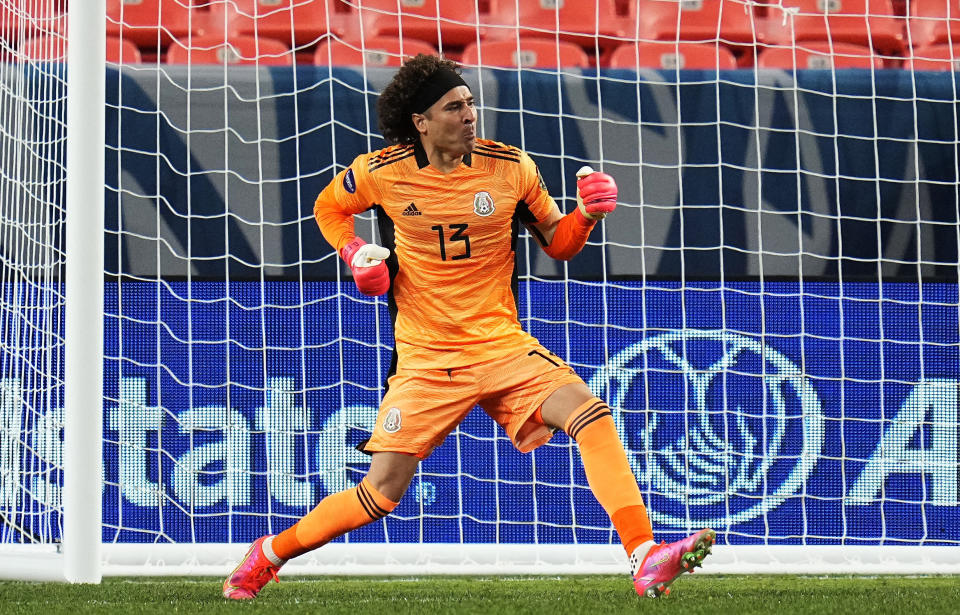 Mexico's Guillermo Ochoa celebrates the team's win on penalty kicks against Costa Rica during a CONCACAF Nations League soccer semifinal, Thursday, June 3, 2021, in Denver. (AP Photo/Jack Dempsey)