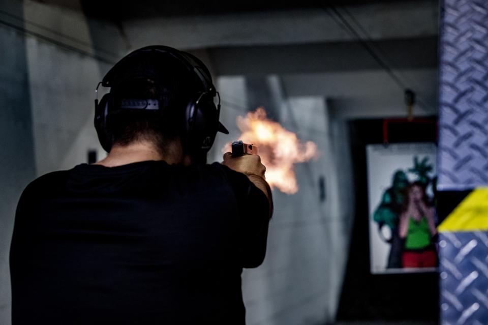 Freddy Torres does target shooting at Riverside Indoor Shooting Range in Riverside.